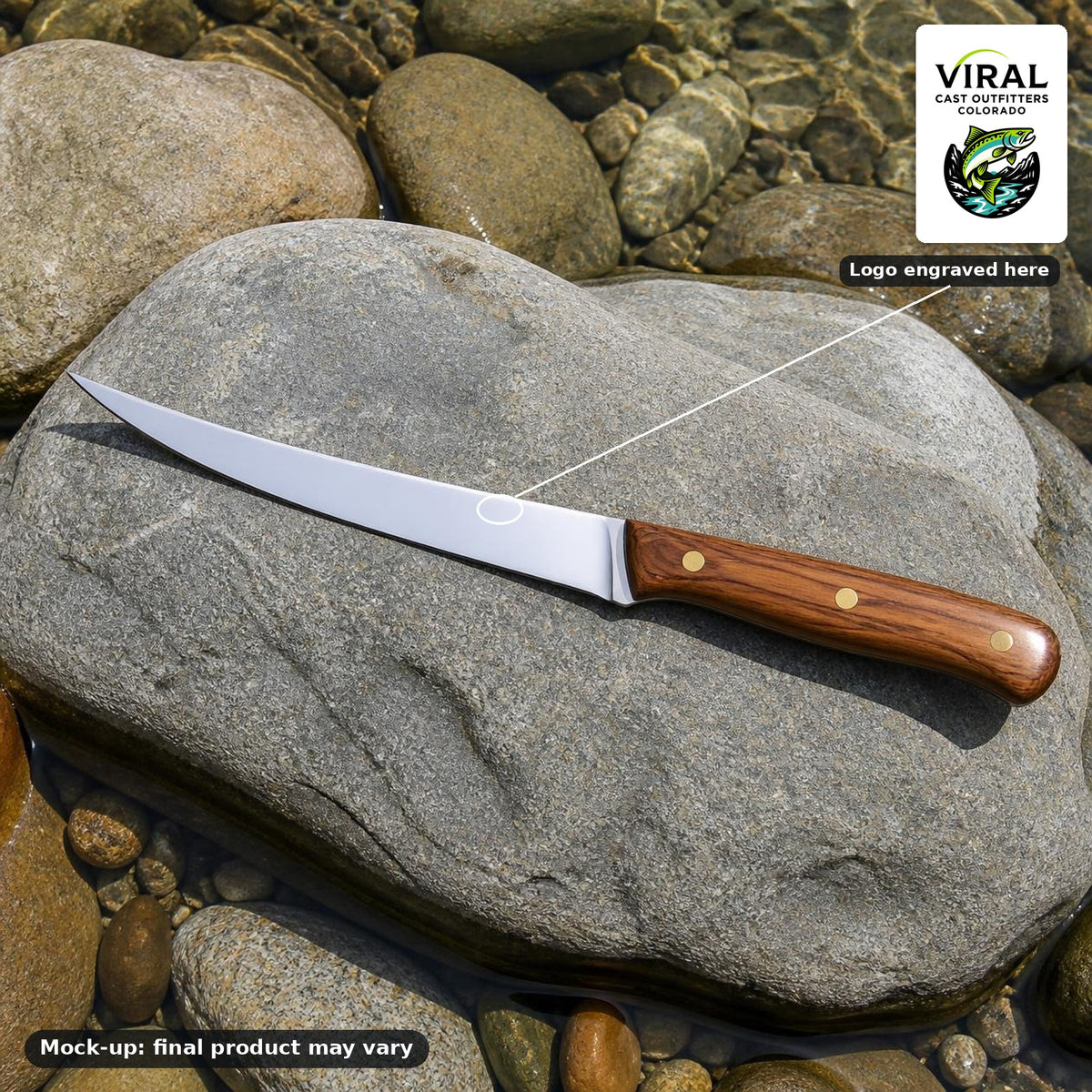 Mock-up, not a product photo: 7 inch fillet knife with a wood handle on river rock, showing where the VCO logo will be engraved. Final product may vary.